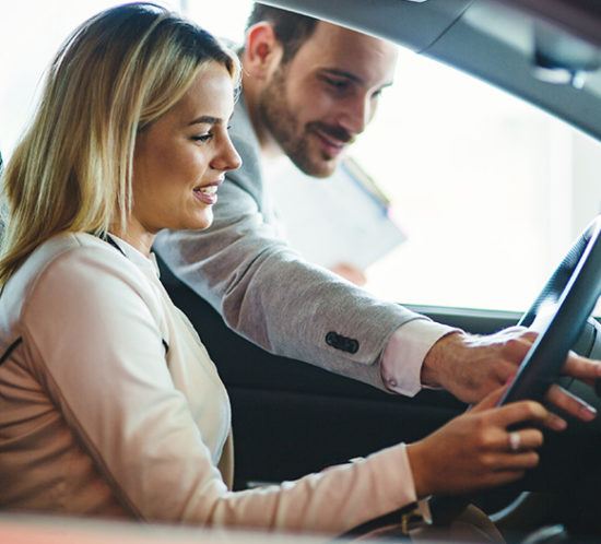 Woman looking to buy a car to promote Howard Insurance Brokers - Commercial Motor Insurance